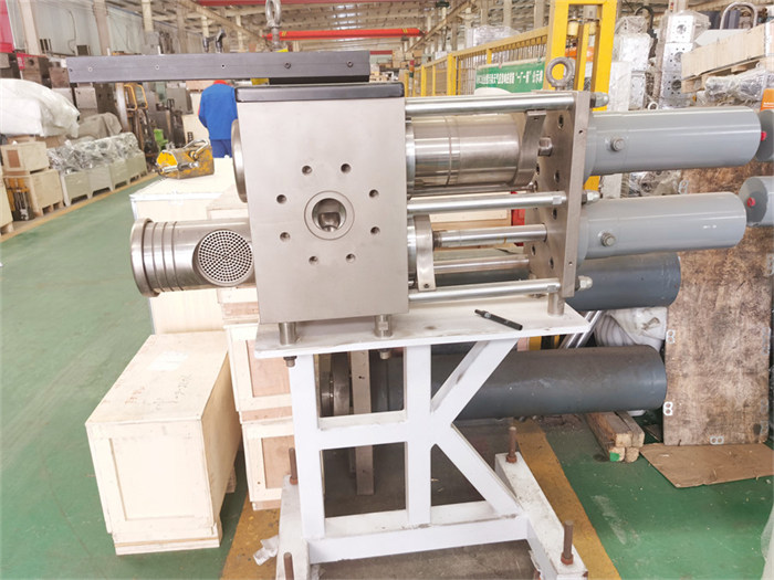 Double piston continuous hydraulic screen changer